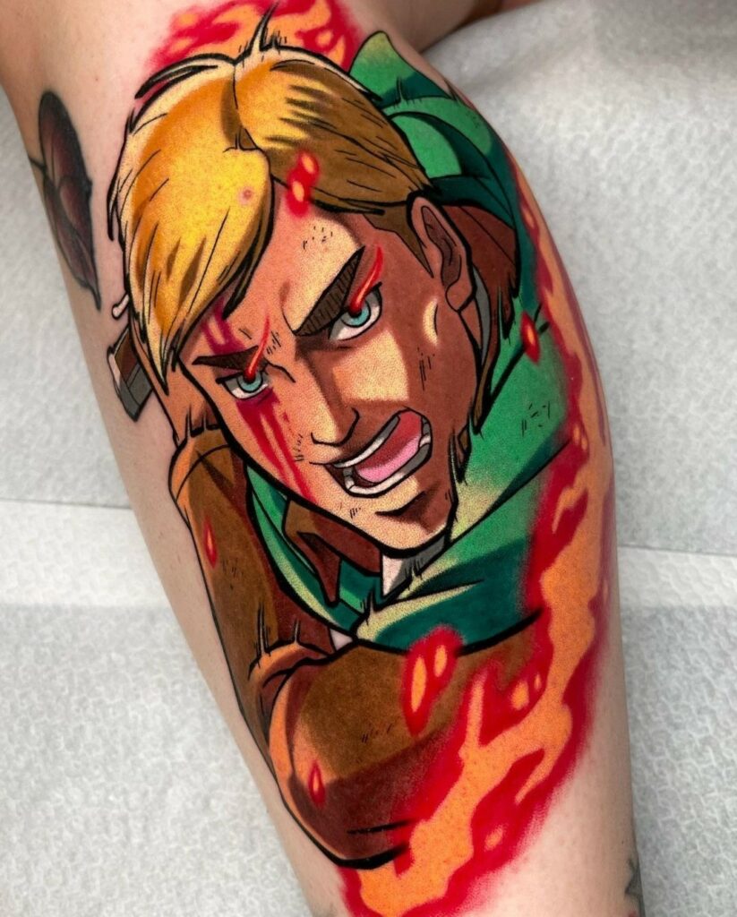 Artista: Eke Tattooer. Pro Team Artist Water Law Tattoo. Tatuaggio in stile cartoon di Erwin, personaggio del manga Attack on Titan.